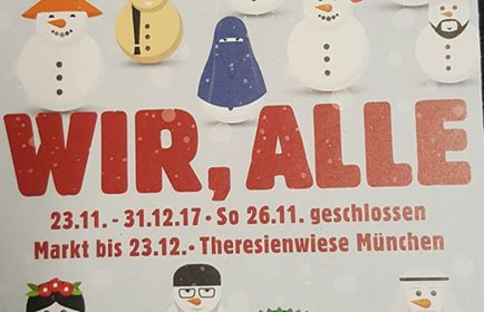 Burkás hóemberrel reklámoznak egy német karácsonyi vásárt