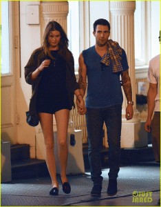 **EXCLUSIVE** SHE WILL BE LOVED! Maroon 5 singer Adam Levine walks hand in hand with new girlfriend model Behati Prinsloo as they walk back to their hotel on a warm night after dining at Blue Ribbon restaurant in the SoHo neighborhood of New York City