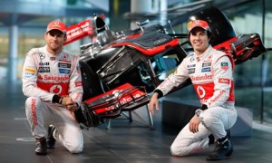 McLaren drivers Jenson Button and Sergio Pérez with the new MP4-28.