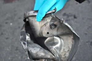 Boston Marathon bomb scene pictures taken by investigators show the remains of an explosive device
