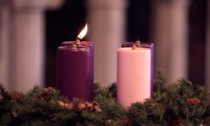 CANDLE IN ADVENT WREATH PICTURED DURING MASS AT MARYLAND CHURCH