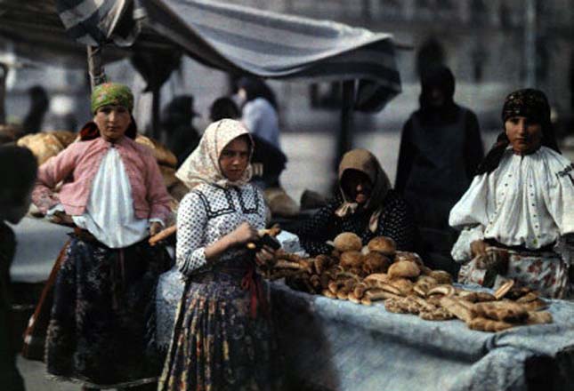 Peasant women sell bread at the market