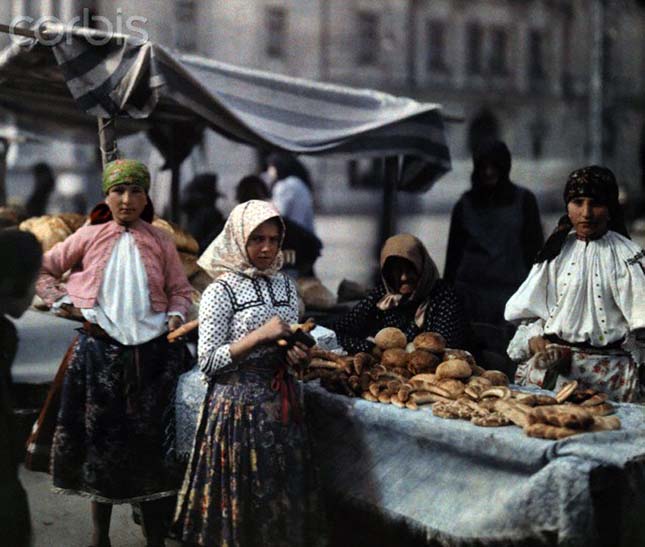 Peasant women sell bread at the market