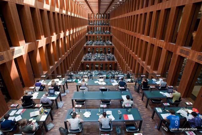 Interior of large atrium study area at Jacob-und-Wilhelm-Grimm-Zentrum  new library at Humboldt University in Berlin Germany
