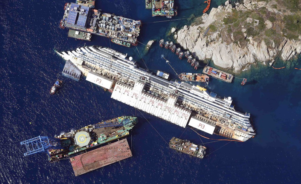 File photo of an aerial view of the Costa Concordia as it lies on its side next to Giglio Island taken from an Italian navy helicopter
