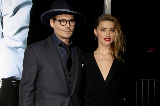 A pénzen marakodik Johnny Depp és Amber Heard