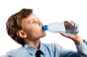 Schoolboy drinking water