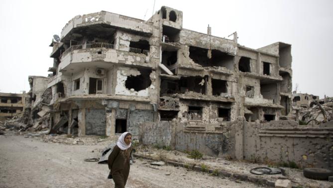 APTOPIX Mideast Syria Returning to Homs