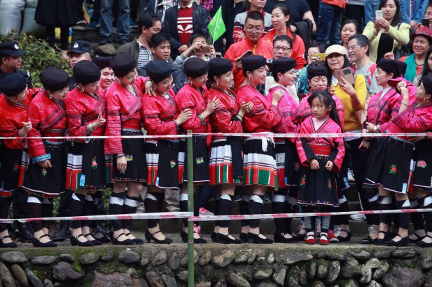 GUILIN, CHINA - APRIL 09: (CHINA OUT) Red Yao women prepare for the performance during the Long Hair Festival at Longji Huangluo Yao Village on April 9, 2016 in Guilin, Guangxi Zhuang Autonomous Region of China. Yao people celebrated the first Long Hair Festival during the Double Third Festival on March 3 of the Chinese calendar. (Photo by VCG/VCG via Getty Images)