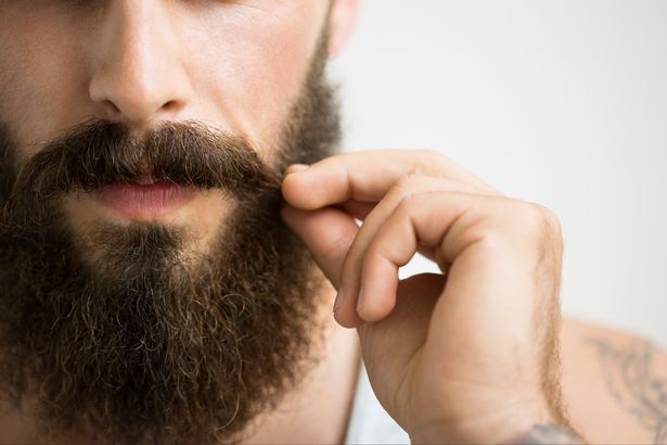 Man-stroking-beard